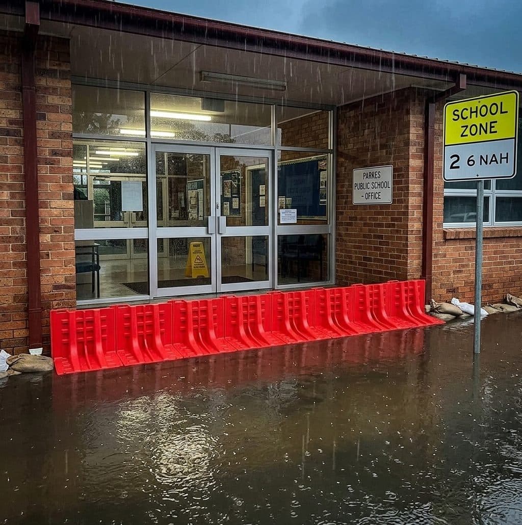 ABS portable flood barriers deployed at a school building entrance