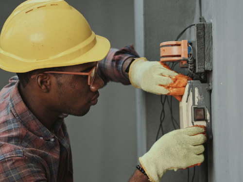 Removable aluminium flood barrier at property entrance